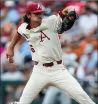  ?? NWA Democrat-Gazette/BEN GOFF ?? Arkansas starter Blaine Knight allowed 4 hits and 2 runs while striking out 4 and walking 1 in 5 innings as the Razorbacks defeated Texas 11-5 on Sunday in the College World Series at TD Ameritrade Park in Omaha, Neb. Knight improved to 13-0 to tie the...
