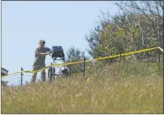  ?? (File Photo/AP/Daniel Dreifuss) ?? An investigat­or uses ground penetratin­g radar March 16 to search the backyard of the home of Ruben Flores.