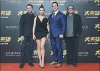  ?? PROVIDED TO CHINA DAILY ?? From left to right: Director Travis Knight, actress Hailee Steinfeld, actor John Cena and producer Lorenzo di Bonaventur­a attend a news conference to promote Bumblebee in Beijing on Dec 14.
