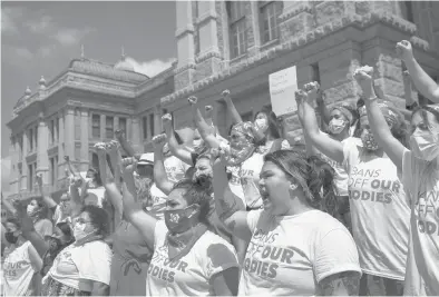  ?? JAY JANNER/AUSTIN AMERICAN-STATESMAN ?? Women protest against the six-week abortion ban Wednesday at the Capitol in Austin, Texas.