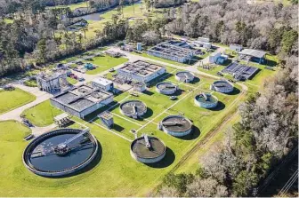  ?? Jason Fochtman/Staff photograph­er ?? Police say operators at the Kingwood Central Wastewater Treatment Plant, run by Inframark, falsified documents and samples to suggest they had adequately treated sewage when they had not.