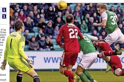  ??  ?? HOP TO IT: Cummings rises highest to reach Keatings’ cross and send the ball beyond Ayr keeper Fleming