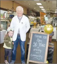  ?? (NWA Democrat-Gazette/Lynn Kutter) ?? Lynn Kutter may be reached by email at lkutter@nwadg.com. Sterling Drug in Prairie Grove held a reception April 1 in honor of Gary Davis to celebrate his 50th year as pharmacist for the local store. His youngest granddaugh­ter, Raelynn Chandler, 4, of Tulsa, Okla., was in town to celebrate with her granddad.