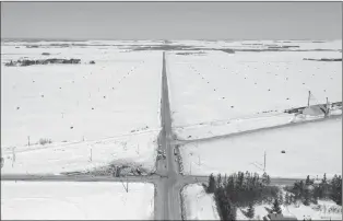  ?? CP FILE PHOTO ?? The wreckage of a fatal crash outside of Tisdale, Sask., is seen Saturday, April, 7, 2018. A consulting firm has recommende­d removing trees obstructin­g vision at an intersecti­on where the Humboldt Broncos bus crash occurred. The 70-page safety review says the current view at the southeast corner of the intersecti­on doesn’t allow a clear sight line.