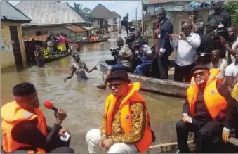  ??  ?? Vice President, Prof Yemi Osinbajo, Governor Willie Obiano of Anambra State and Dr Chris Ngige, during a tour of flooded Anambra communitie­s