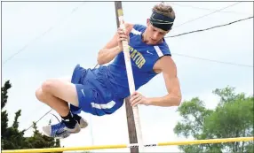  ?? Westside Eagle Observer/MIKE ECKELS ?? Decatur’s Taylor Haisman clears the bar at 8 feet during the pole vault event of the 1A State Track Meet. Haisman finished seventh in the event but went on to win gold in the 800-meter run.