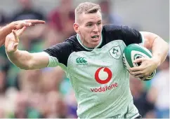  ??  ?? Powerhouse: Ireland’s Chris Farrell in action against Italy