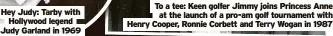  ?? ?? Hey Judy: Tarby with Hollywood legend Judy Garland in 1969
To a tee: Keen golfer Jimmy joins Princess Anne at the launch of a pro-am golf tournament with Henry Cooper, Ronnie Corbett and Terry Wogan in 1987