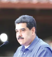  ?? (Miraflores Palace handout via Reuters) ?? VENEZUELAN PRESIDENT Nicolas Maduro speaks at a United Socialist Party youth event in Caracas on Monday.