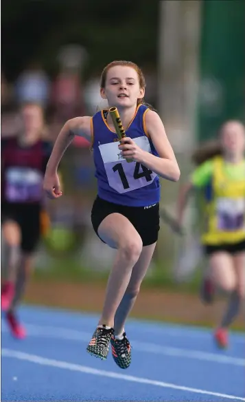  ??  ?? Sarah Kiernan of Lakeside, Co. Wicklow, competing in the Relay 4x100mU-12 and O-10 Girls event during day one of the Aldi Community Games August Festival at the University of Limerick.