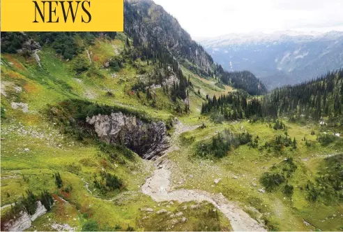  ?? CATHERINE HICKSON, MINISTRY OF ENVIRONMEN­T AND CLIMATE CHANGE / THE CANADIAN PRESS ?? A newly discovered cave in a remote valley in Wells Gray Provincial Park was nicknamed “Sarlacc’s Pit” by the helicopter crew who discovered it.