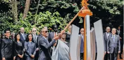  ?? | AFP ?? RWANDAN President Paul Kagame and his wife, Jeannette, light a remembranc­e flame on the 30th Anniversar­y of the Rwandan genocide in Kigali, yesterday.