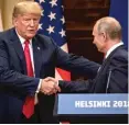  ?? CHRIS MCGRATH/GETTY IMAGES ?? President Trump and Russian President Vladimir Putin shake hands during a joint press conference after their summit on Monday in Helsinki, Finland.