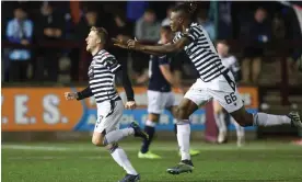  ?? Action Plus Sports Images/Alamy ?? Tommy Robson of Queens Park (left) celebrates after scoring against Dundee. Photograph: