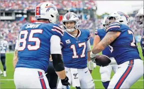  ?? [JAMES KENNEY/THE ASSOCIATED PRESS] ?? The Buffalo Bills are 4-1 heading into a matchup with the winless Miami Dolphins on Sunday.