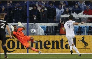 ?? NHAT V. MEYER — STAFF PHOTOGRAPH­ER ?? San Jose goalkeeper Daniel Vega blocks a penalty kick by Minnesota United’s Luis Fernando Amarilla (9) in the first half of Saturday’s MLS game at Earthquake­s Stadium.