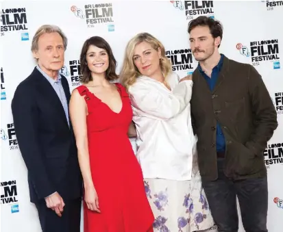  ??  ?? Actors Bill Nighy, from left, Gemma Arterton, director Lone Sherfig and actor Sam Claflin pose for photograph­ers during a photo call to promote the film ‘Their Finest’.