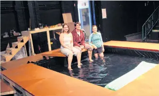  ?? Richard Mackenzie ?? Theatre Antigonish actors Madison Kendall (left) and Brendan Ahern are joined by stage manager Ashley Pettipas in the pool constructe­d on the Bauer Theatre stage for the play Metamorpho­ses, which runs from Nov. 7 to 10, as well as Nov. 17 and 18.