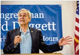  ?? TAMIR KALIFA / AMERICAN-STATESMAN ?? U.S. Rep. Lloyd Doggett, D-Austin, speaks at a town hall meeting on health care in July. Doggett attacked President Trump’s health-care executive order Thursday as an attempt to sabotage the Affordable Care Act.