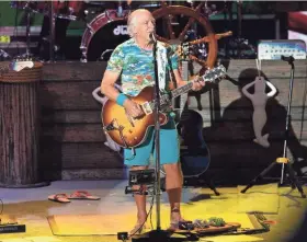  ?? COLIN BOYLE/MILWAUKEE JOURNAL SENTINEL ?? Jimmy Buffett and the Coral Reefer Band perform at Alpine Valley Music Theatre on Saturday.