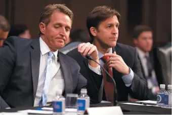  ??  ?? Senators Jeff Flake and Ben Sasse during the Senate Judiciary Committee’s vote on the nomination of Neil Gorsuch to the Supreme Court, April 2017