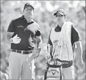  ?? Eric Risberg Associated Press ?? TIM MICKELSON, right, was going to be the agent for rising star Jon Rahm until his brother, left, called.