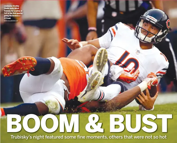  ?? DAVID ZALUBOWSKI/AP ?? Linebacker Bradley Chubb sacks Mitch Trubisky for a safety at 7:47 of the first quarter, giving the Broncos a 2-0 lead.