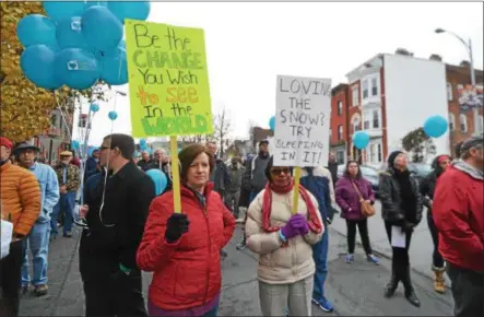  ?? FILE PHOTOS. ?? Nearly 100people attend the 35th annual Winter Walk benefiting Joseph’s House and Shelter in Troy. From left are Maureen Micka of Latham and MaryAnn Milton of Cohoes.