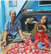  ?? Reuters ?? Fareeda and her husband Abdul Hanif sit with their four-year-old daughter at their house in New Delhi.