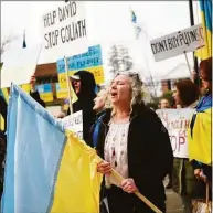  ?? Tyler Sizemore / Hearst Connecticu­t Media file photo ?? Stamford’s Nataliya Trofort sings the Ukrainian national anthem during the Rally for Ukraine outside Town Hall in Greenwich on March 1. The rally is just one of many signs of support in town for the people of Ukraine since the Russian invasion in late February. More than 200 people attended the rally.