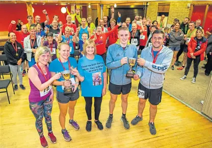 ?? Pictures: Steve MacDougall. ?? From left: Nicola Livingston­e presents Hailey Marshall with her trophy while Margaret Duncan, widow of Stuart, is alongside men’s winner Alistair Gudgin, being presented with his prize by Ross Duncan. Ross and Nicola are Stuart’s children.