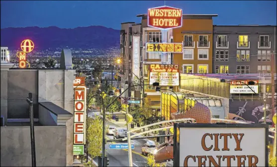  ?? L.E. Baskow Las Vegas Review-Journal @Left_Eye_Images ?? The Fremont9 apartment complex, rear, on Fremont Street is a legacy of Tony Hsieh and his Downtown Project.