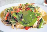  ??  ?? Pad ped pla duk (stir-fried catfish).