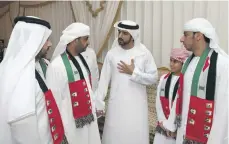  ?? Wam ?? Sheikh Hamdan bin Mohammed, Crown Prince of Dubai, offers condolence­s to the family of one of four servicemen who died on duty as part of the Arab Coalition in Yemen