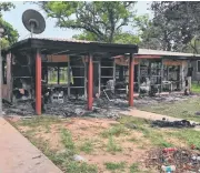  ??  ?? VOLATILE SITUATION: Police pictures of damage in Aurukun after unrest at New Year.