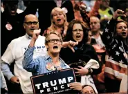  ?? REUTERS ?? Supporters of Republican US presidenti­al nominee Donald Trump scream and gesture at members of the media at a campaign rally in Cincinnati, Ohio on Thursday.