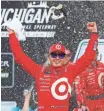  ?? PAUL SANCYA, AP ?? Kyle Larson celebrates Sunday after winning the Pure Michigan 400.