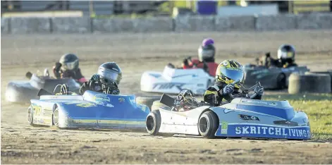  ?? BOB TYMCZYSZYN/POSTMEDIA NEWS ?? BobCat of Hamilton kart racing series at Merrittvil­le Speedway in Thorold, Tuesday.