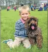  ??  ?? One boy and his dog. Photograph: Sara Bain.