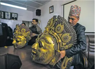  ?? NIRANJAN SHRESTHA FOR THE ASSOCIATED PRESS ?? Stolen masks of Hindu deity Lord Bhairabh dating to the 16th century that were repatriate­d to Nepal are displayed at the Department of Archaeolog­y last month in Kathmandu. They are among dozens of artifacts being returned to the Himalayan nation as part of a growing repatriati­on effort.