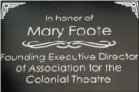  ?? PHOTO COURTESY OF THE COLONIAL THEATRE ?? Long-time Colonial Theatre Executive Director Mary Foote left her position July 31. More than 100 people came together that day to say goodbye. During the event, Foote was presented with a plaque, seen here to mark her 20 years of service. She also received a painting by local artist Teresa Haag, that was a gift from the Colonial staff.