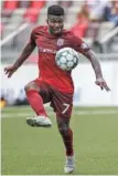  ?? STAFF PHOTO BY TROY STOLT ?? Chattanoog­a midfielder Ualefi looks in a bouncing pass during the Red Wolves’ 4-0 victory against the New England Revolution II on Saturday at CHI Memorial Stadium in East Ridge.