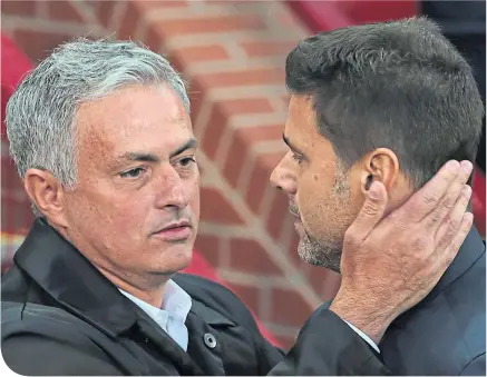  ??  ?? There is obviously a lot of respect between Jose Mourinho and Mauricio Pochettino, but now one has replaced the other as manager of Tottenham Hotspur