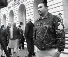  ?? ASSOCIATED PRESS ?? IN THIS MARCH 13 FILE PHOTO, TEHASSI HILL, TRIBAL CHAIRMAN of the Oneida Nation, stands outside a federal appeals court in New Orleans following arguments on the constituti­onality of a 1978 law giving Native American families preference in adoption of Native American children. On Friday, the 5th U.S. Circuit Court of Appeals in New Orleans upheld the constituti­onality of the law.