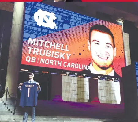  ??  ?? Like just about everyone, Mitch Trubisky ( on stage Thursday) had no inkling the Bears were planning to draft him. | ELSA/ GETTY IMAGES