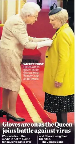  ??  ?? SAFETY FIRST Queen wears gloves as she gives actress Wendy Craig a CBE award