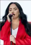  ?? Associated Press ?? National anthem singer Demi Lovato figures to make someone’s Super Bowl a little richer. But can she eat a sandwich while doing it?