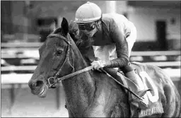  ?? COADY PHOTOGRAPH­Y ?? Maxfield wins the Grade 3 Matt Winn Stakes at Churchill.