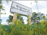  ?? (NWA Democrat-Gazette/Hank Layton) ?? A welcome sign at Bob Boyer Park in Midland. The Sebastian County Quorum Court is set to consider allowing the county to apply for grant money from the Arkansas Department of Transporta­tion to help implement a plan for the park, which includes designs for additional trails, pavilions and elevated boardwalks. Go to nwaonline.com/220501Dail­y/ for today’s photo gallery.