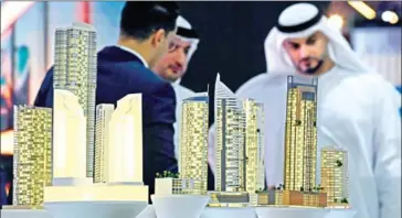  ?? KARIM SAHIB/AFP ?? Property firms offered unpreceden­ted payment terms to drum up business at Cityscape Global Exhibition 2019 at the Dubai World Trade Centre in the Gulf emirate.